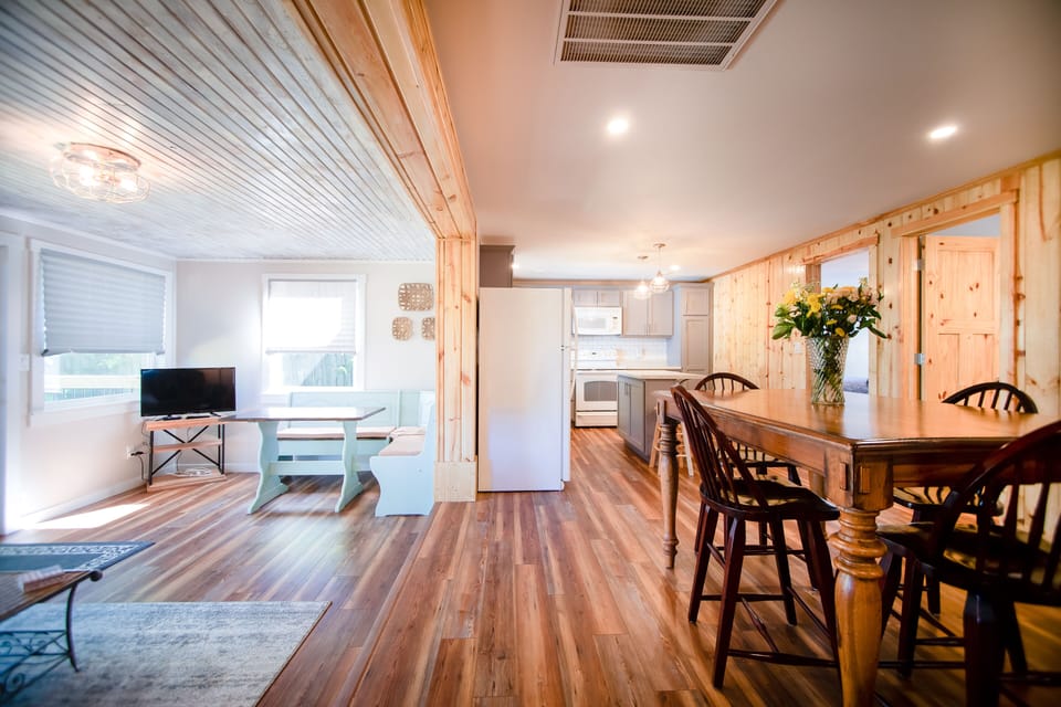 Corner nook has been replaced by two comfy chairs in tv room.