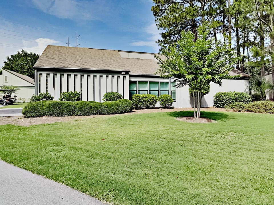 Augusta Village 523 - Lawn space next to house, by car port