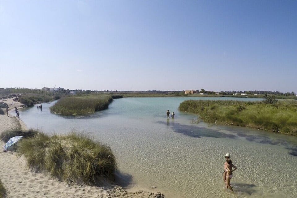 The idume enters on the left, fills the laghetto to the right as it heads to sea