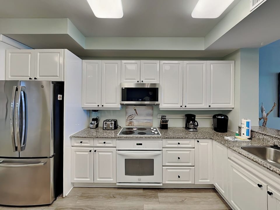 Fully Equipped Kitchen with Stainless Steel Appliances