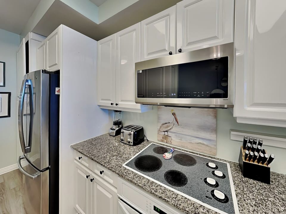 Fully Equipped Kitchen with Stainless Steel Appliances