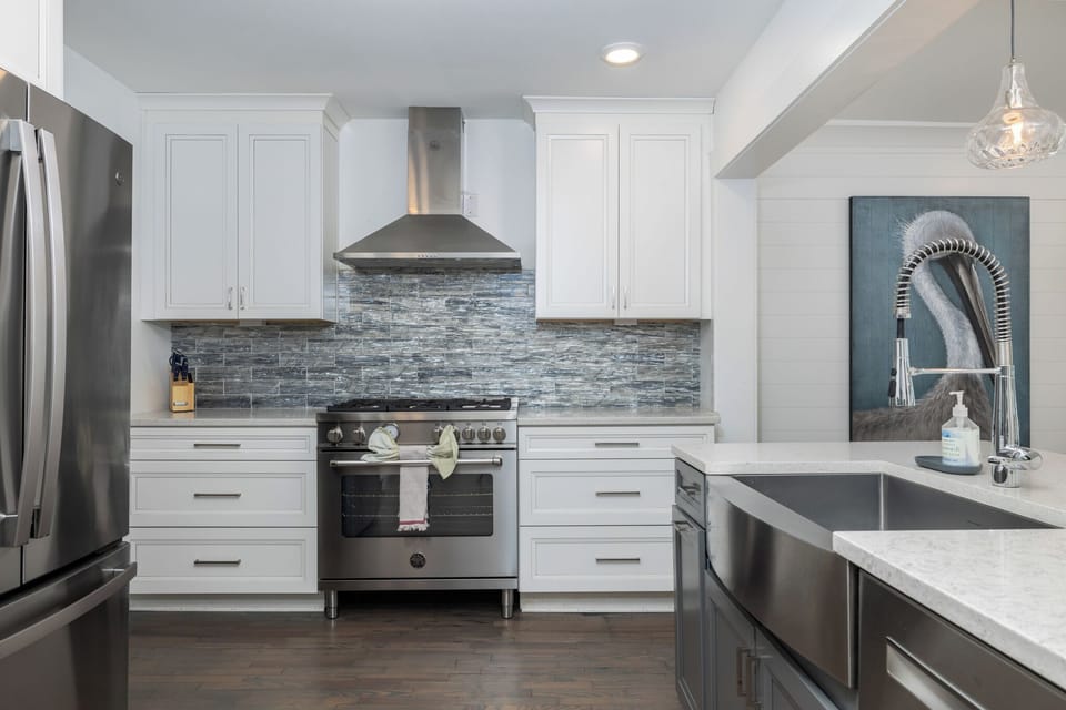 Cook dinners on your professional grade range with stainless steel vent hood