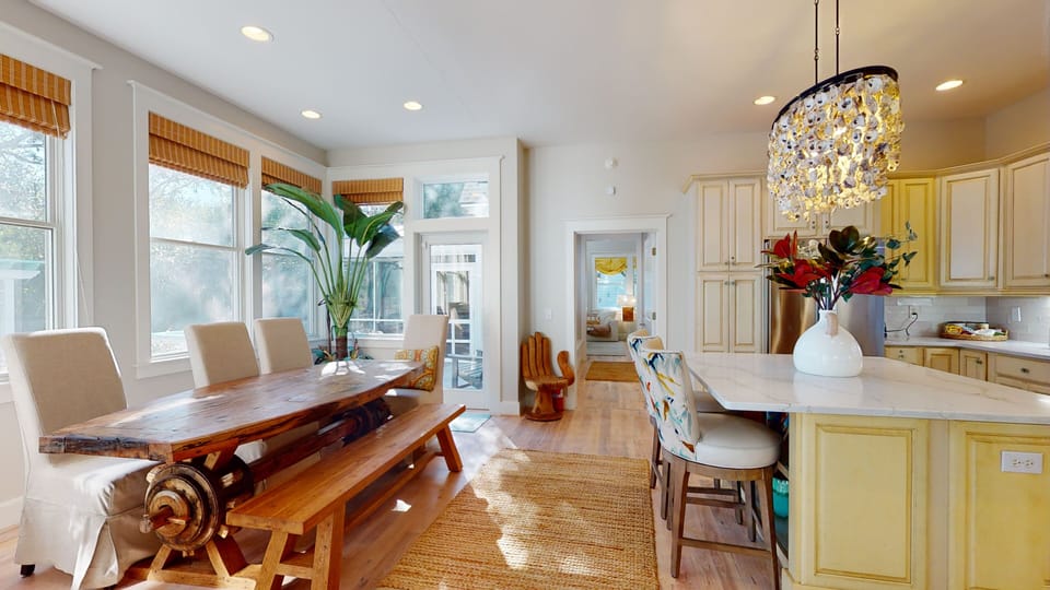 Dining table is a one-of-a-kind custom table made from an old grist mill.
