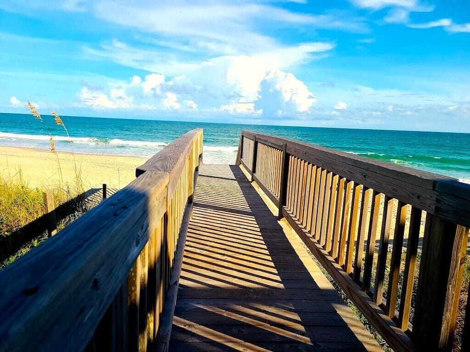 Indulge in beachside bliss with PRIVATE beach access just steps away from home.