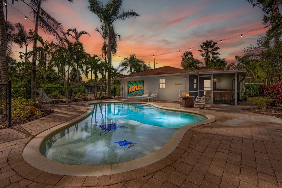 Enjoy a private, poolside paradise lit up at night by string lights and firepit!