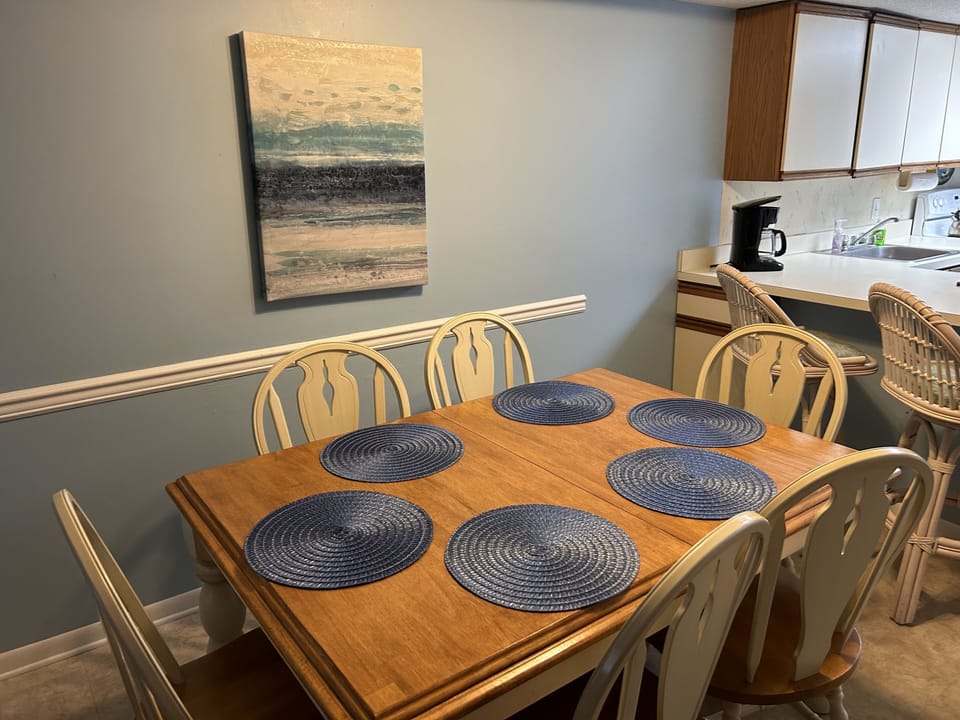 Kitchen table seats 6 plus 2 at the counter.