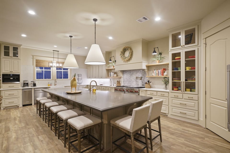 Kitchen with Wolf double oven and griddle. 