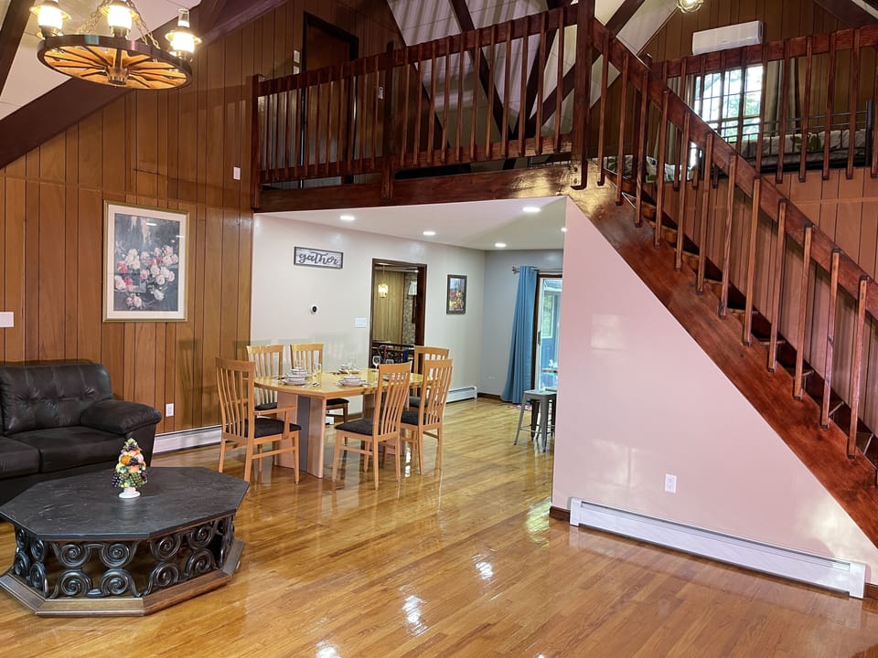 Living room overlooking the dining table and kitchen