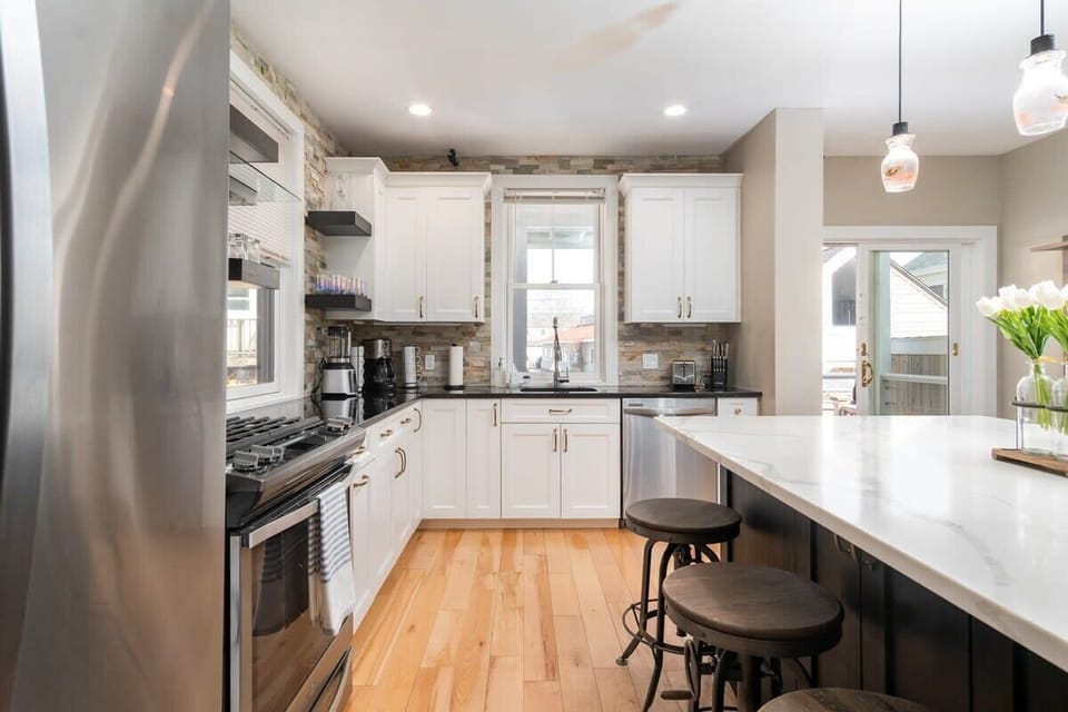 A dream chef's kitchen, with top appliances, perfect for dining and entertaining