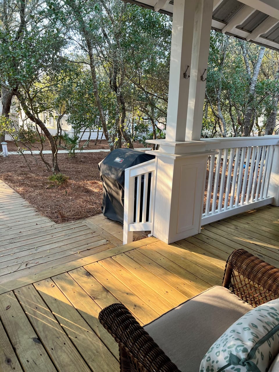 Grill area and boardwalk to the pool