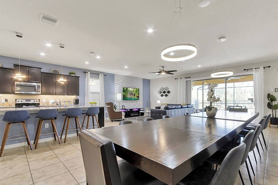 Our dining set can seat 14 people plus another 4 on the island.