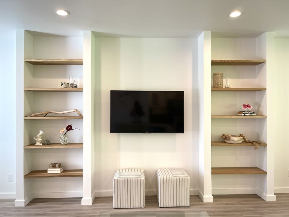 Living Room (I know it looks small but that is a 55" TV...haha)