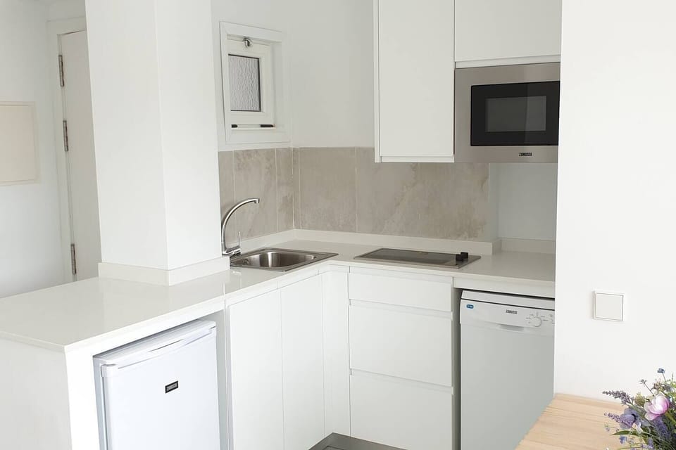 Fully equipped kitchen. Dishwasher, Nespresso, Washing Machine. (in the bathroom)..