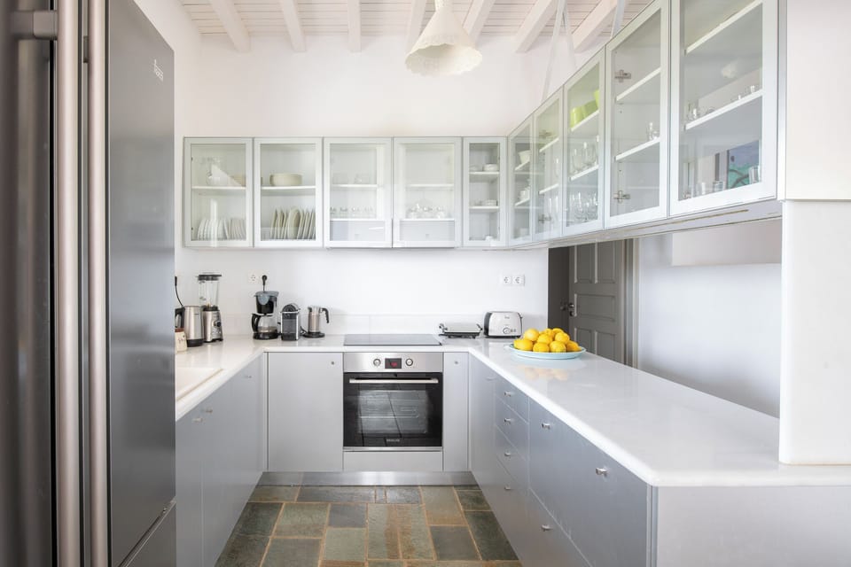 Modern open-plan kitchen with top-of-the-line amenities and appliances
