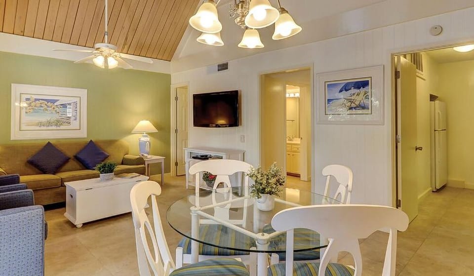 Gather for easy meals under warm lights and airy ceilings.