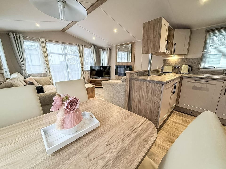 Enjoy the convenience of a comfortable kitchen area of a caravan during your stay at Pakefield Holiday Park, located in the picturesque Pakefield, Suffolk, UK.