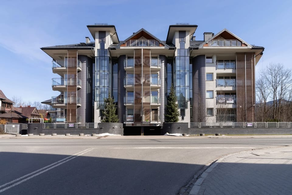 The building's contemporary architecture stands out in the cityscape. 