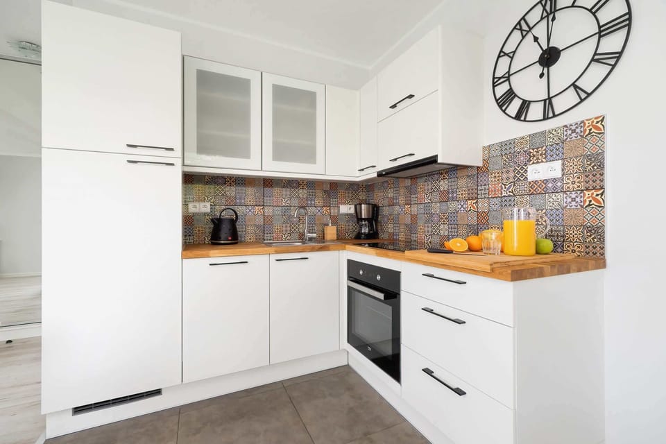 The fully equipped kitchenette includes everything you need for a home-cooked meal.