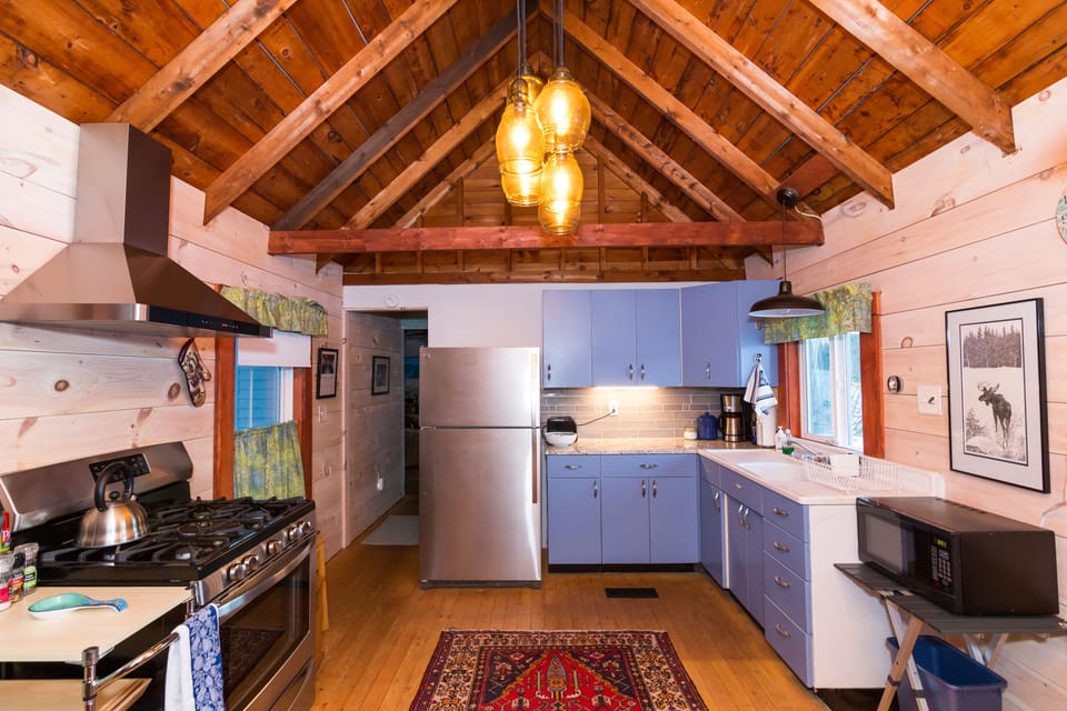 View of kitchen and hall to living room