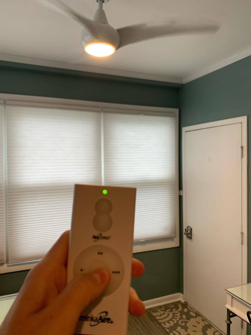 Remote operated ceiling fan in dining area 