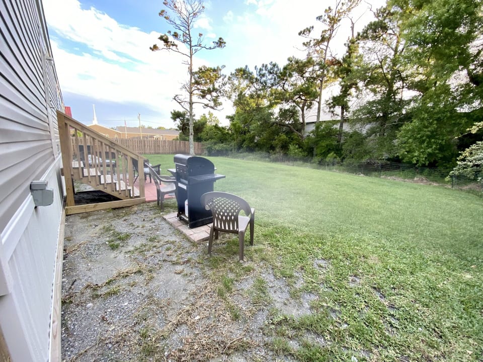 Fenced in Backyard with Gas Grill 