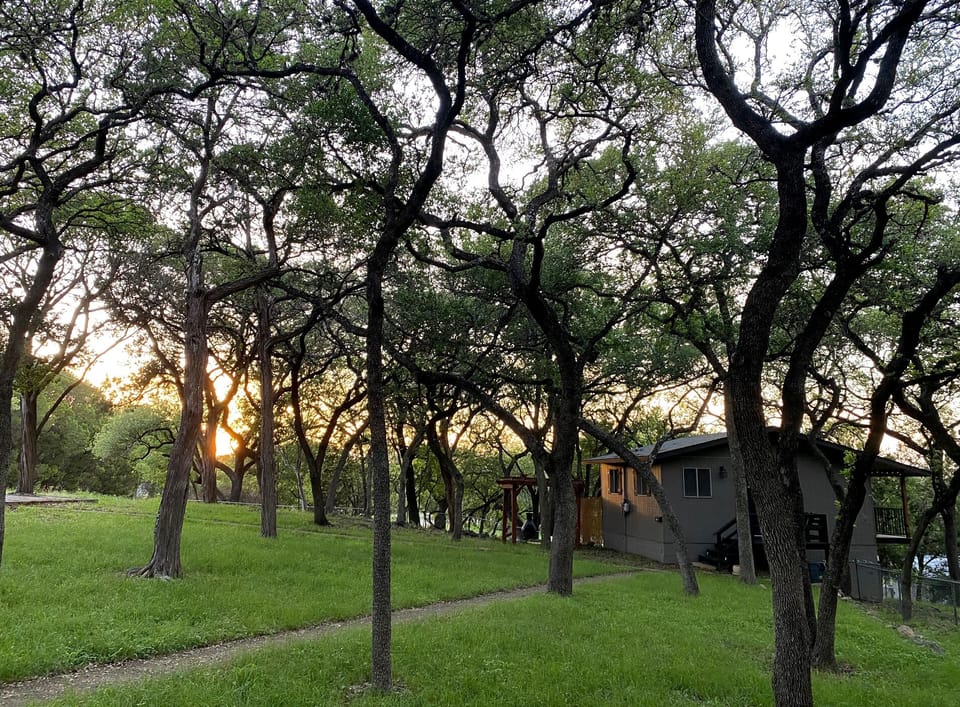 Heavily wooded neighborhood. Bungalow stands alone from main house. 