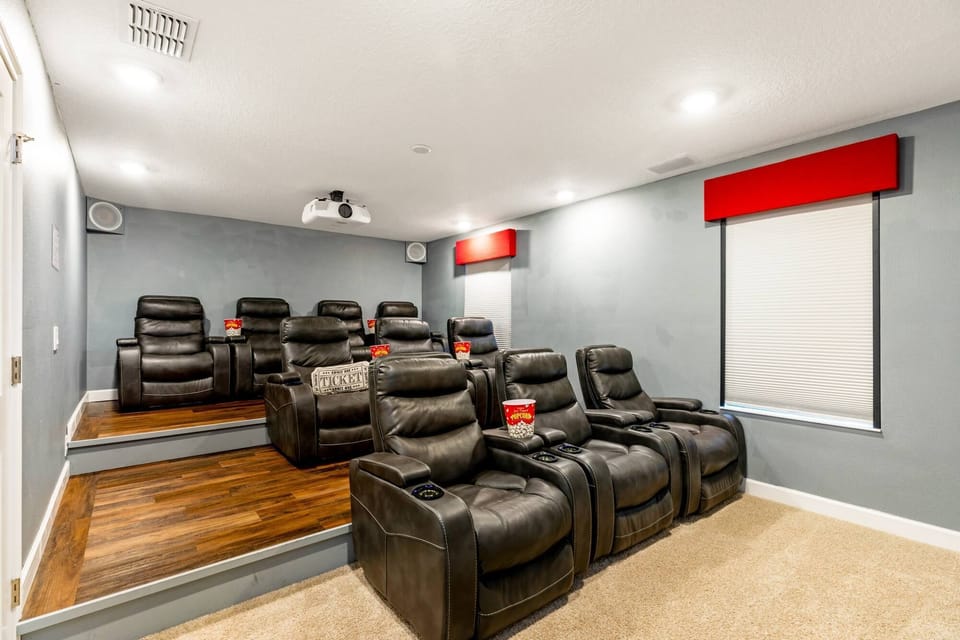 Movie theater has 10 leather power recliners w/stadium seating for top comfort!