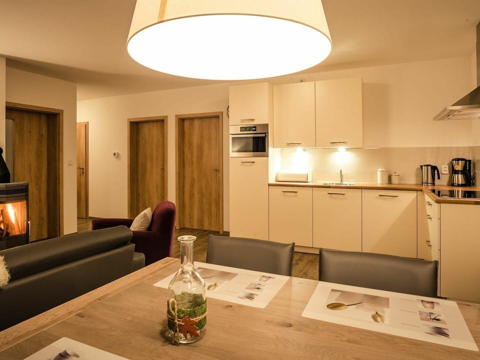 Table, Property, Furniture, Cabinetry, Couch, Wood, Lighting, Interior Design, Lamp, Building