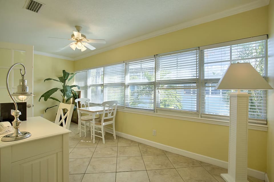 Sip morning coffee in the sunlit nook with garden views.