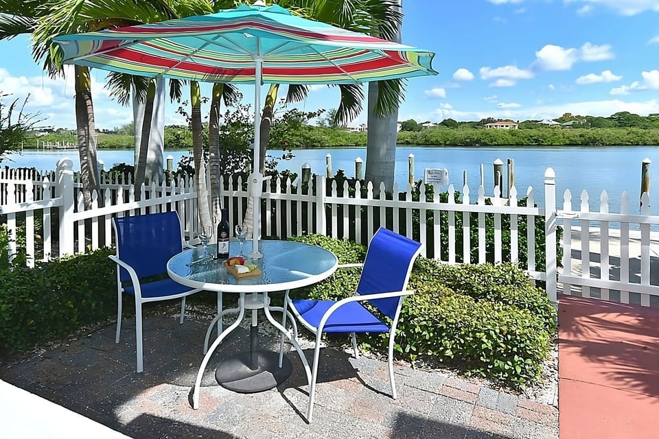 Sip morning coffee outdoors with sparkling waterfront views.