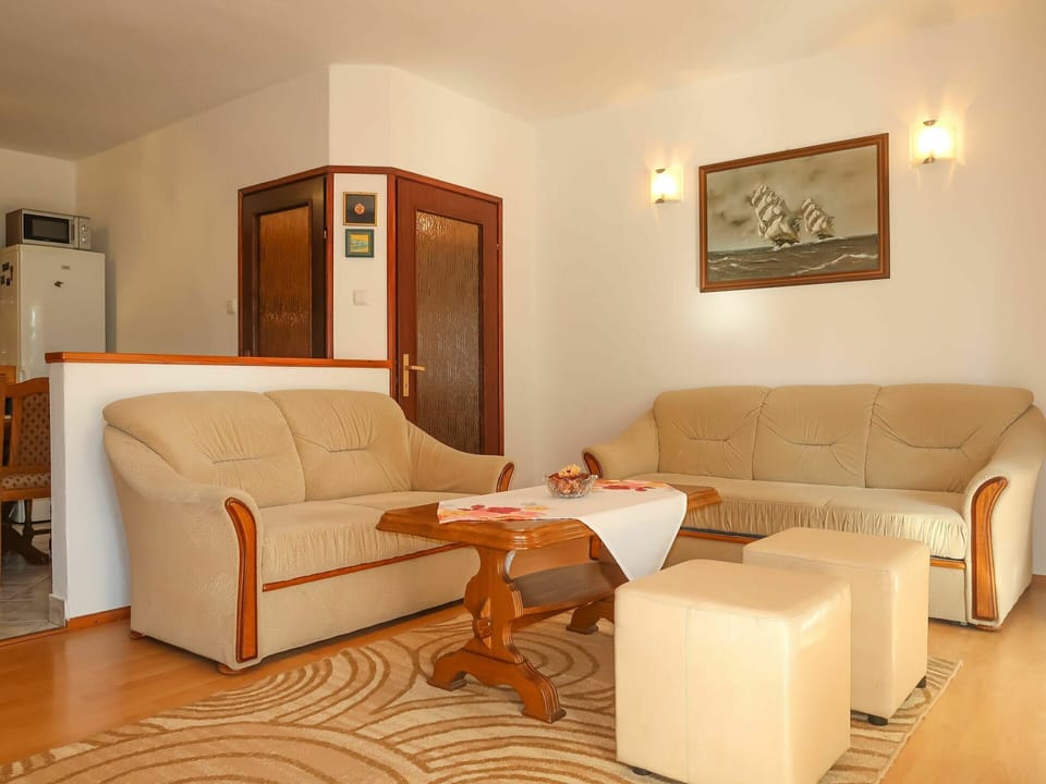 Furniture, Property, Comfort, Wood, Interior Design, Couch, Floor, Flooring, Wall, Studio Couch