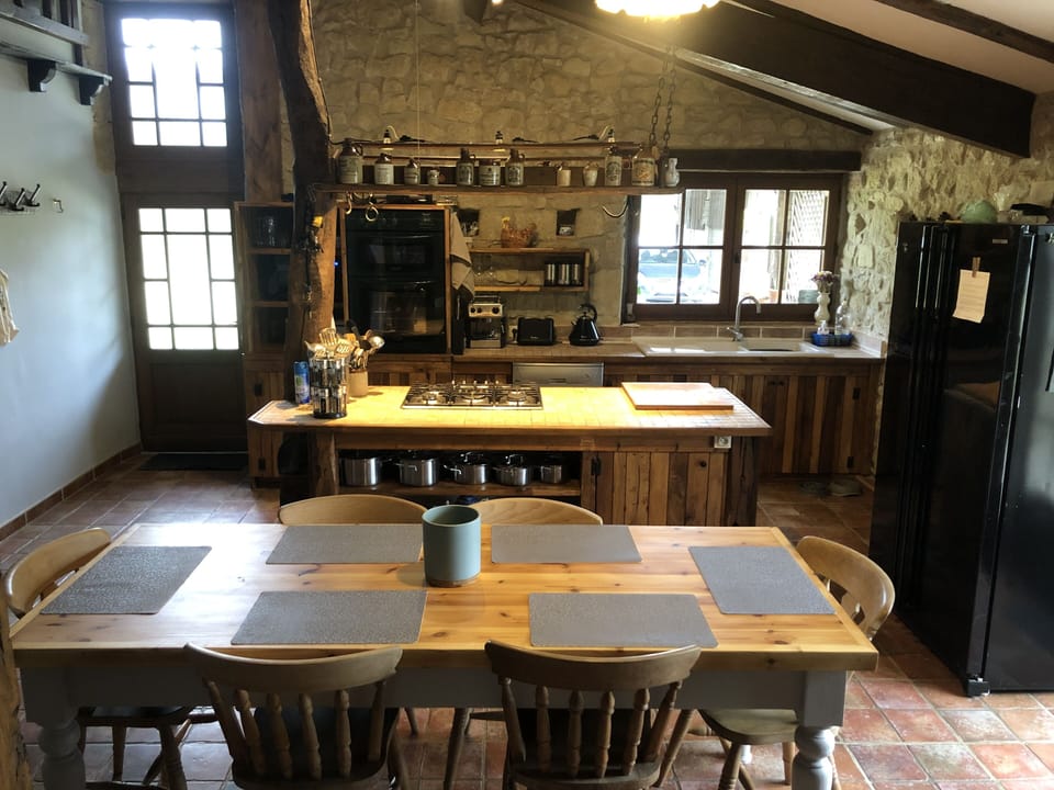 Large open plan kitchen, with island & Indoor eating area for 8