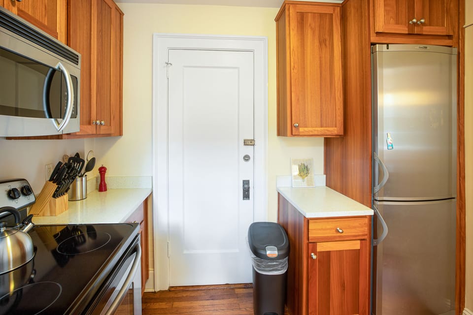 The second entrance can be found off of the kitchen.