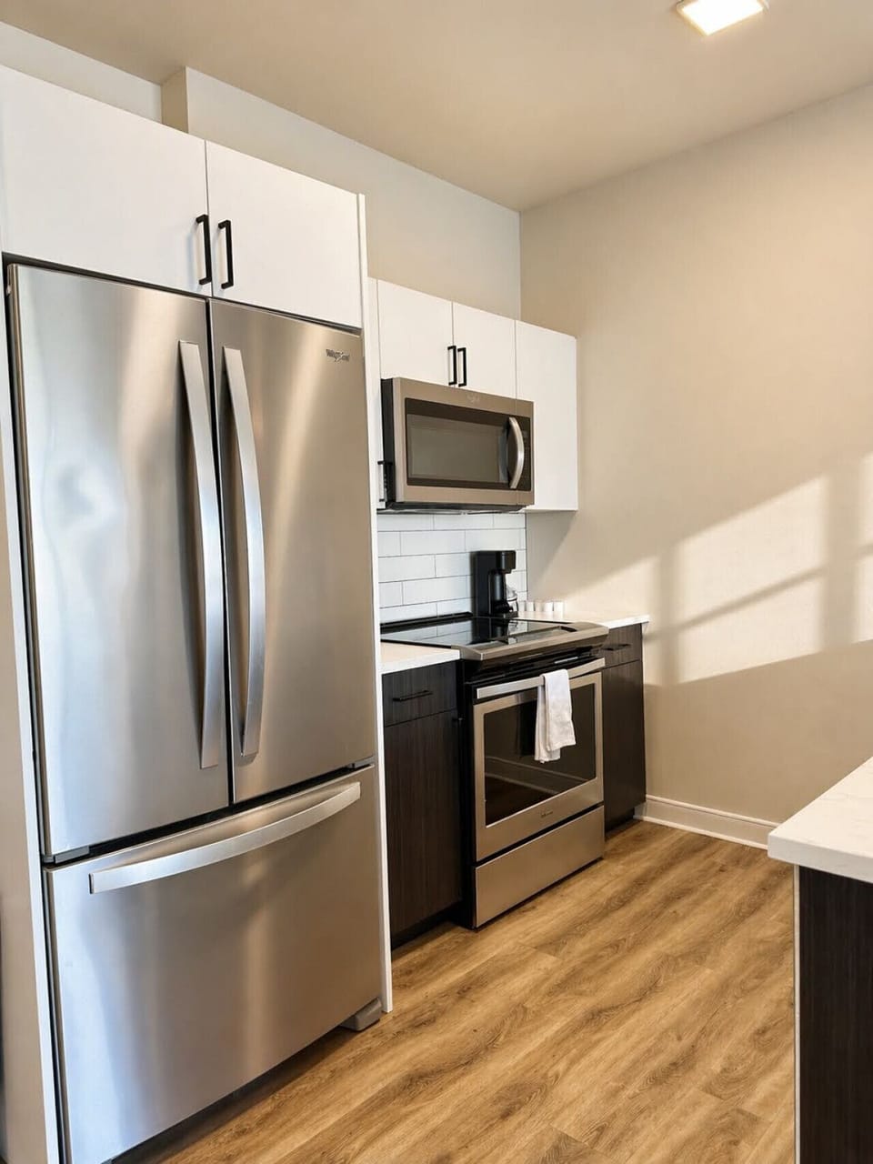 Whip up your favorite meals in this fully equipped, open-concept kitchen that flows seamlessly into the living area—perfect for socializing while you cook