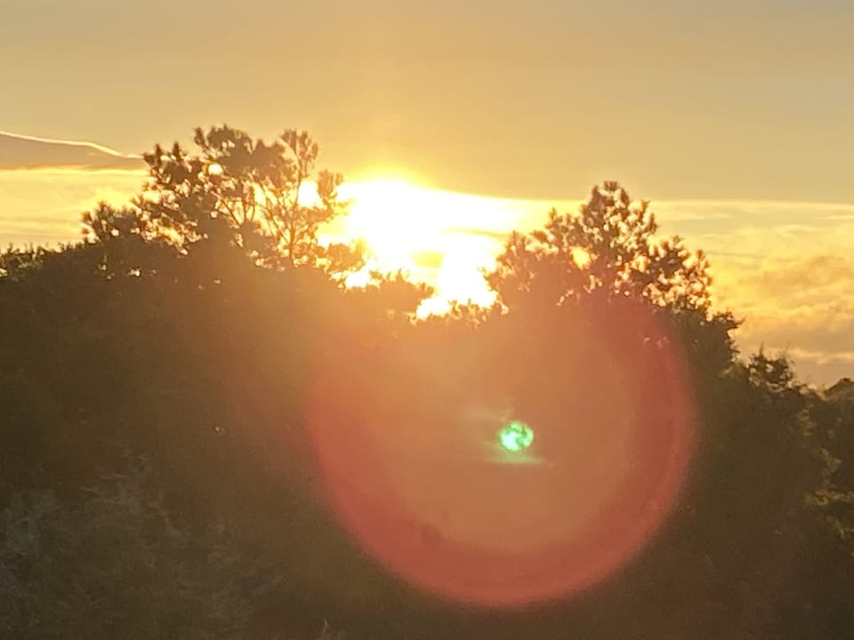 Sunset view from hot tub third floor deck