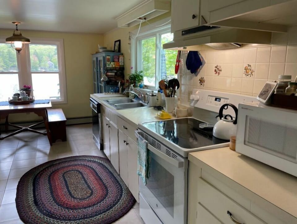 Large kitchen with views of the pond and gardens.