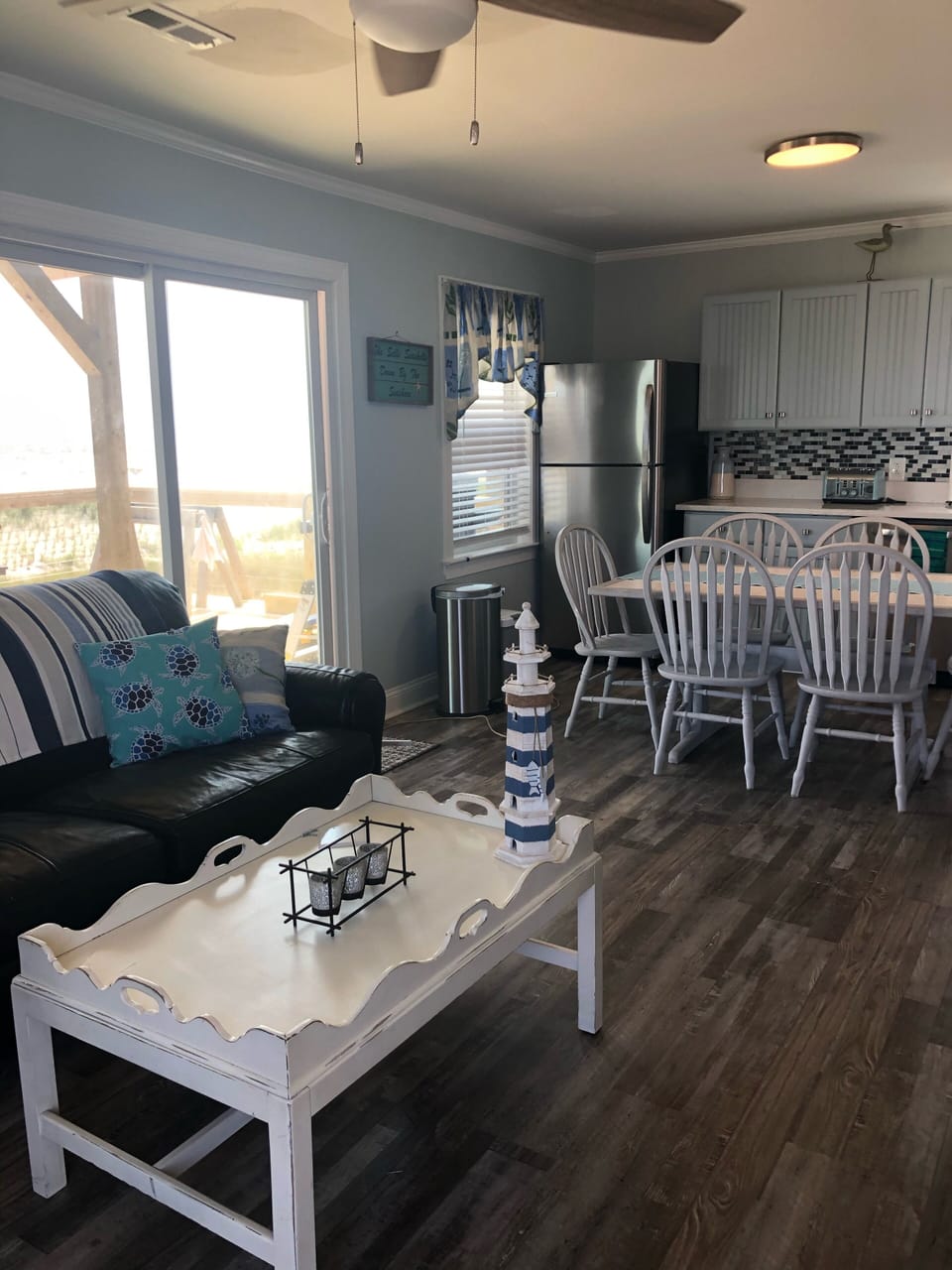 View of living space /kitchen as you enter.  Lots of natural light