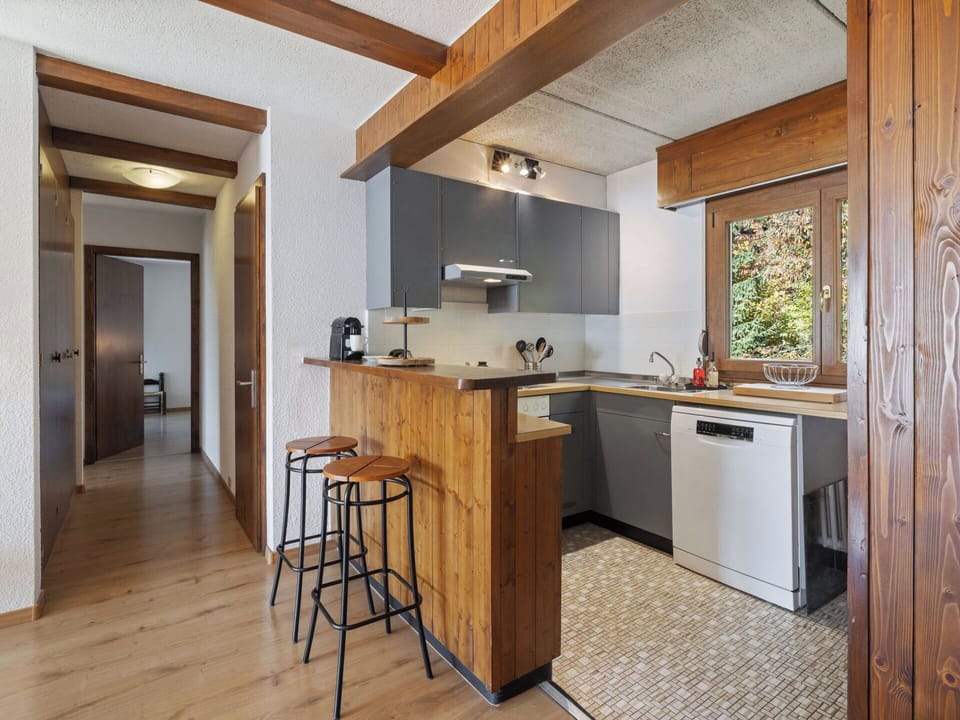 Furniture, Countertop, Kitchen, Interior Design, Flooring, Wood, Ceiling, Cabinetry, Floor, Room