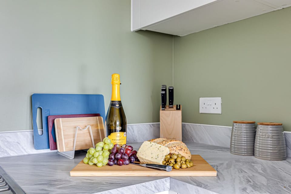 A fully equipped kitchen with everything you need to prepare a home cooked meal.