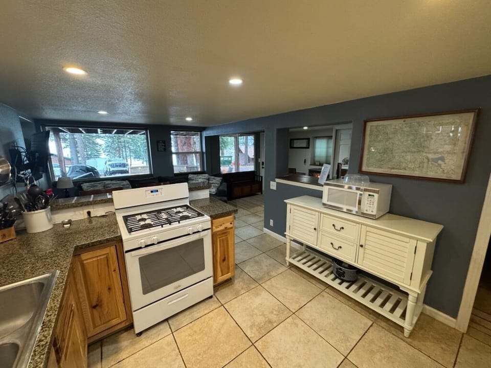 Open kitchen designed for easy meals, snacks, and family time.