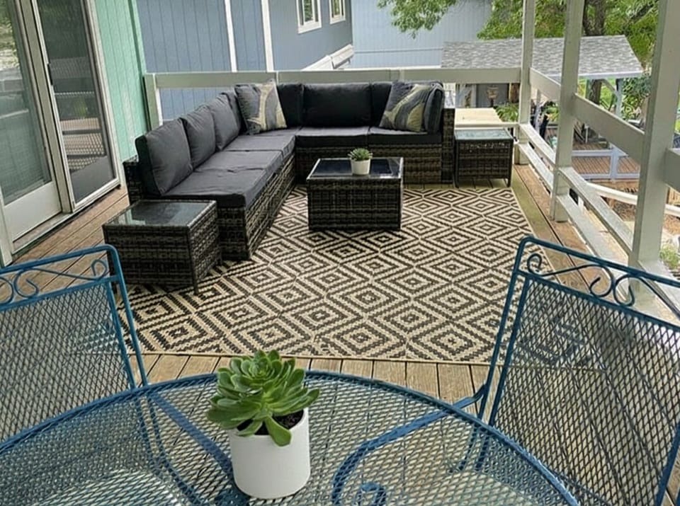 Upstairs deck with a new sectional to view the lake! Accessible off bedrooms!