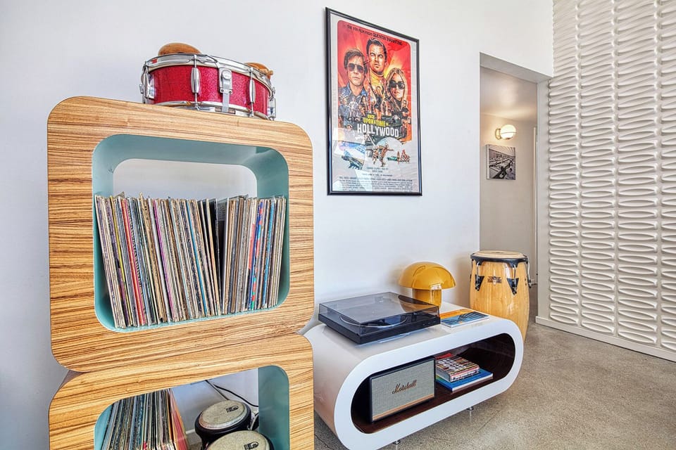 The Music Wall with playable vinyl on a Marshall speaker. Add some percussion!