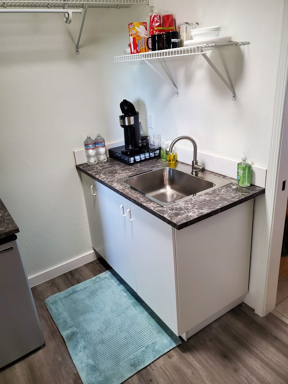 Kitchen with coffee maker.