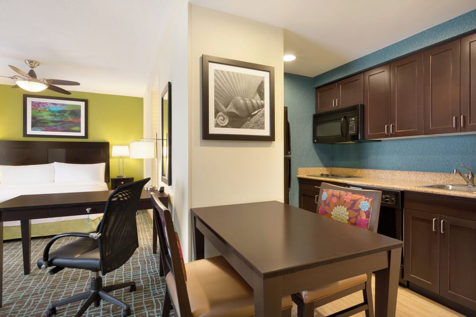 Cook and snack easily with a sleek, well-equipped kitchenette.