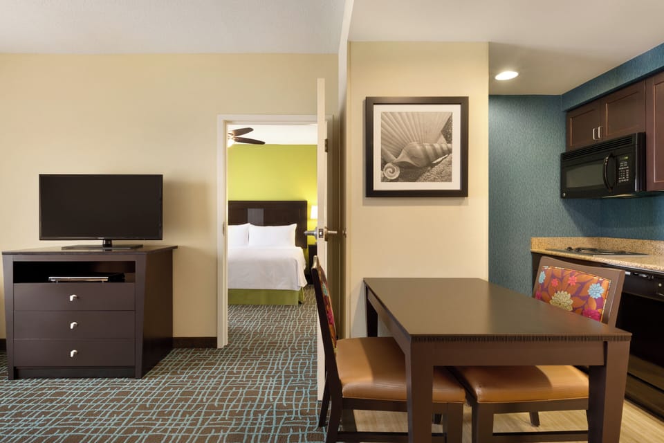 Plan meals and movie nights at the comfortable dining table.