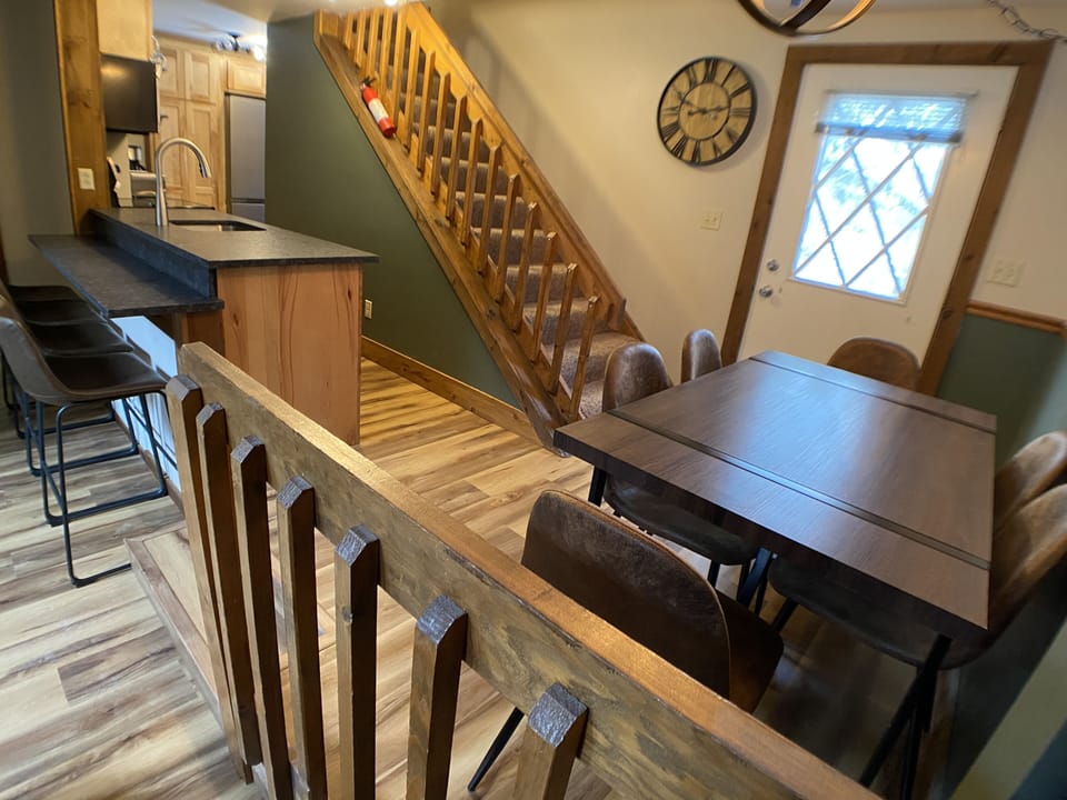 View of the kitchen and dining areas. 