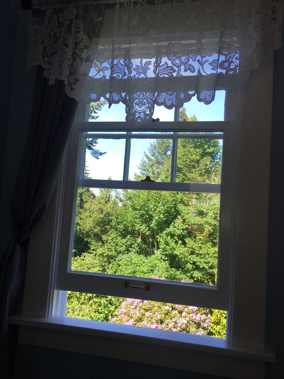 Double hung windows to allow in a fresh breeze in each of the bedrooms.