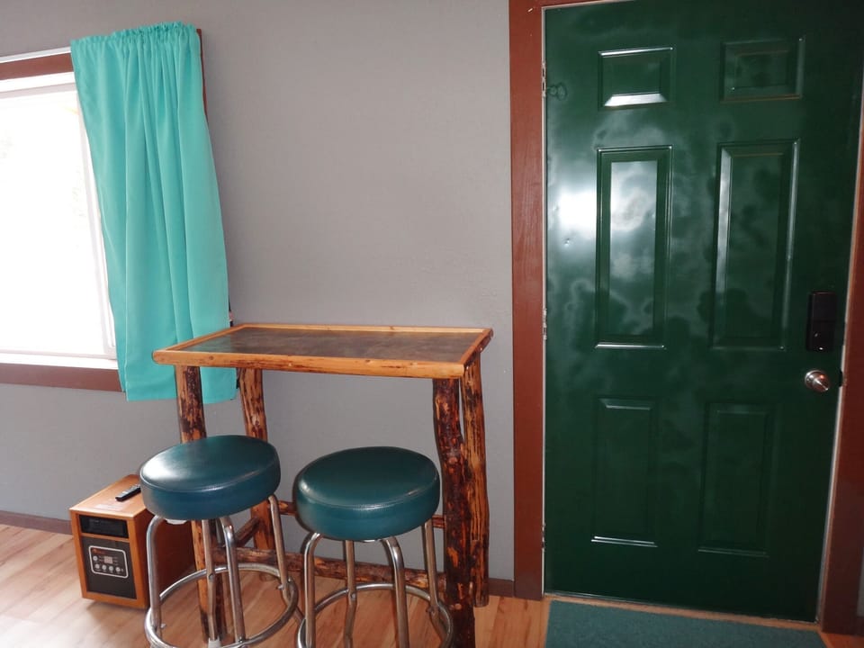 Table and heater in bedroom 3