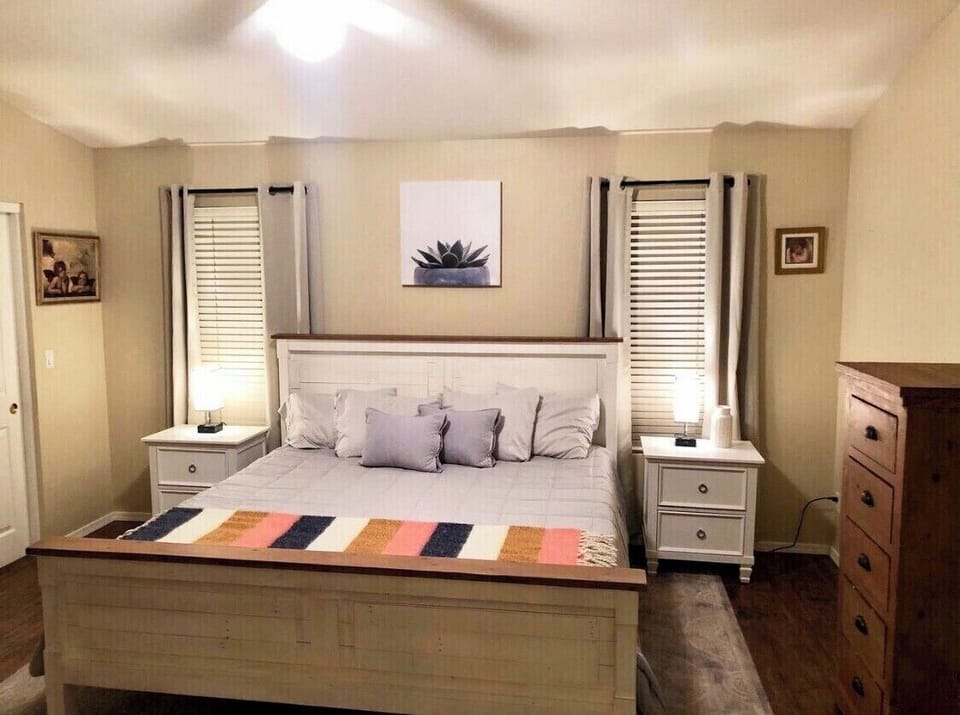 Spacious Master bedroom with king mattress, large walk in closet and 50” TV. 