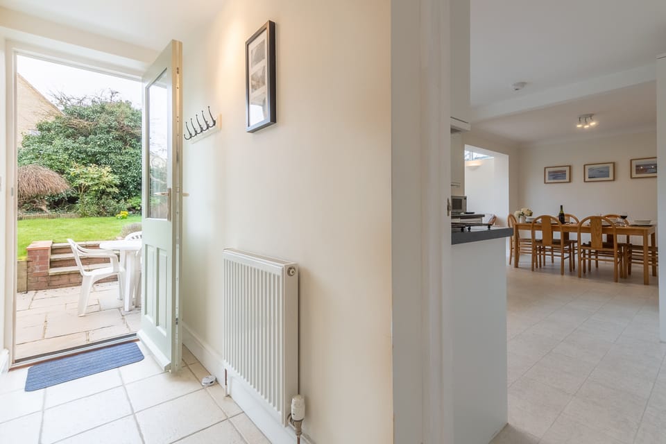 Ground floor: Back hall with doorway to the garden